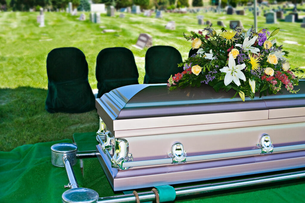 graveside ceremony with a coffin